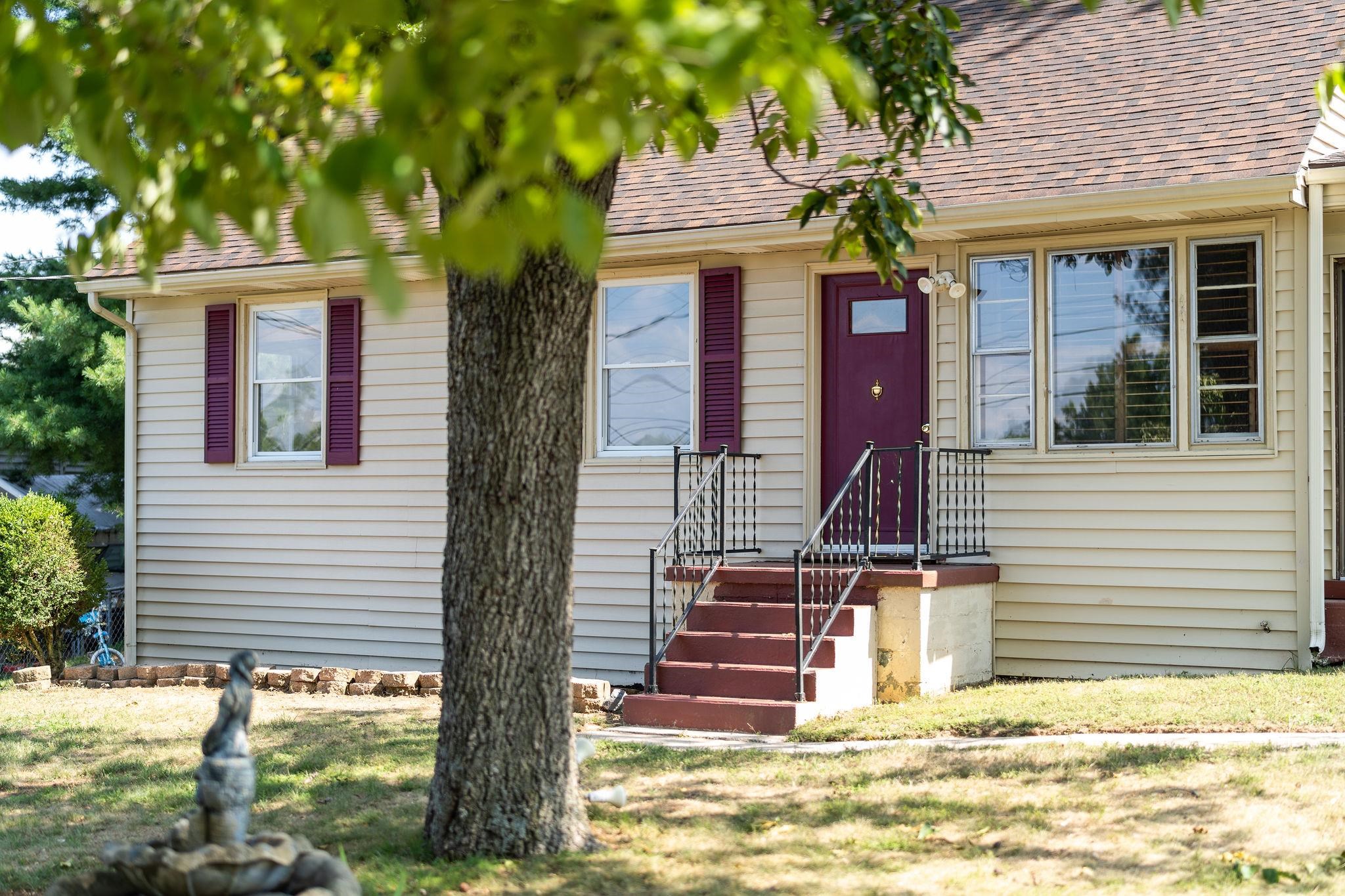 205 Devon Road Staunton, VA 24401 - Photo 7 of 71 a front view of a house with a tree