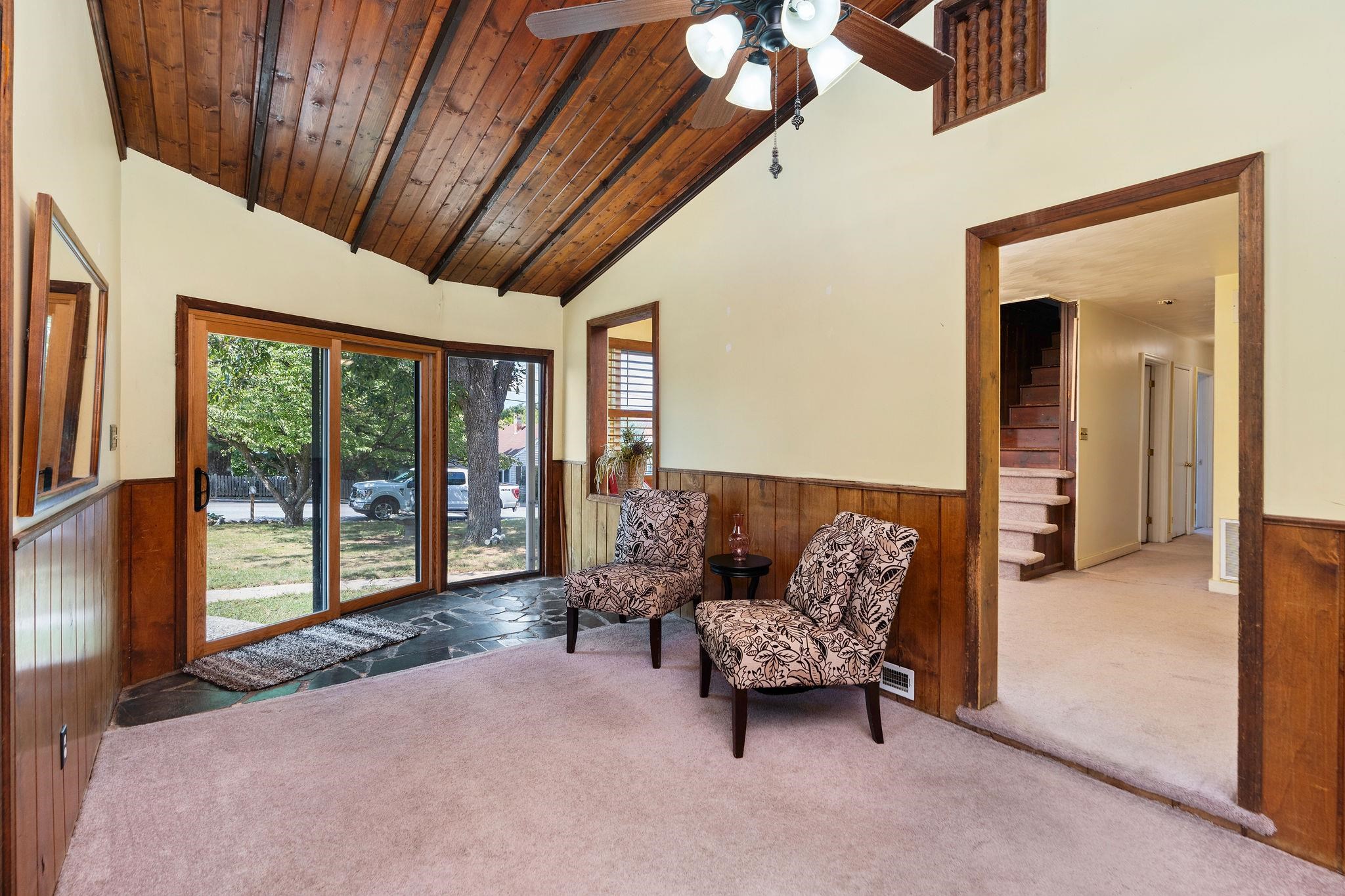205 Devon Road Staunton, VA 24401 - Photo 9 of 71 a living room with furniture and a floor to ceiling window