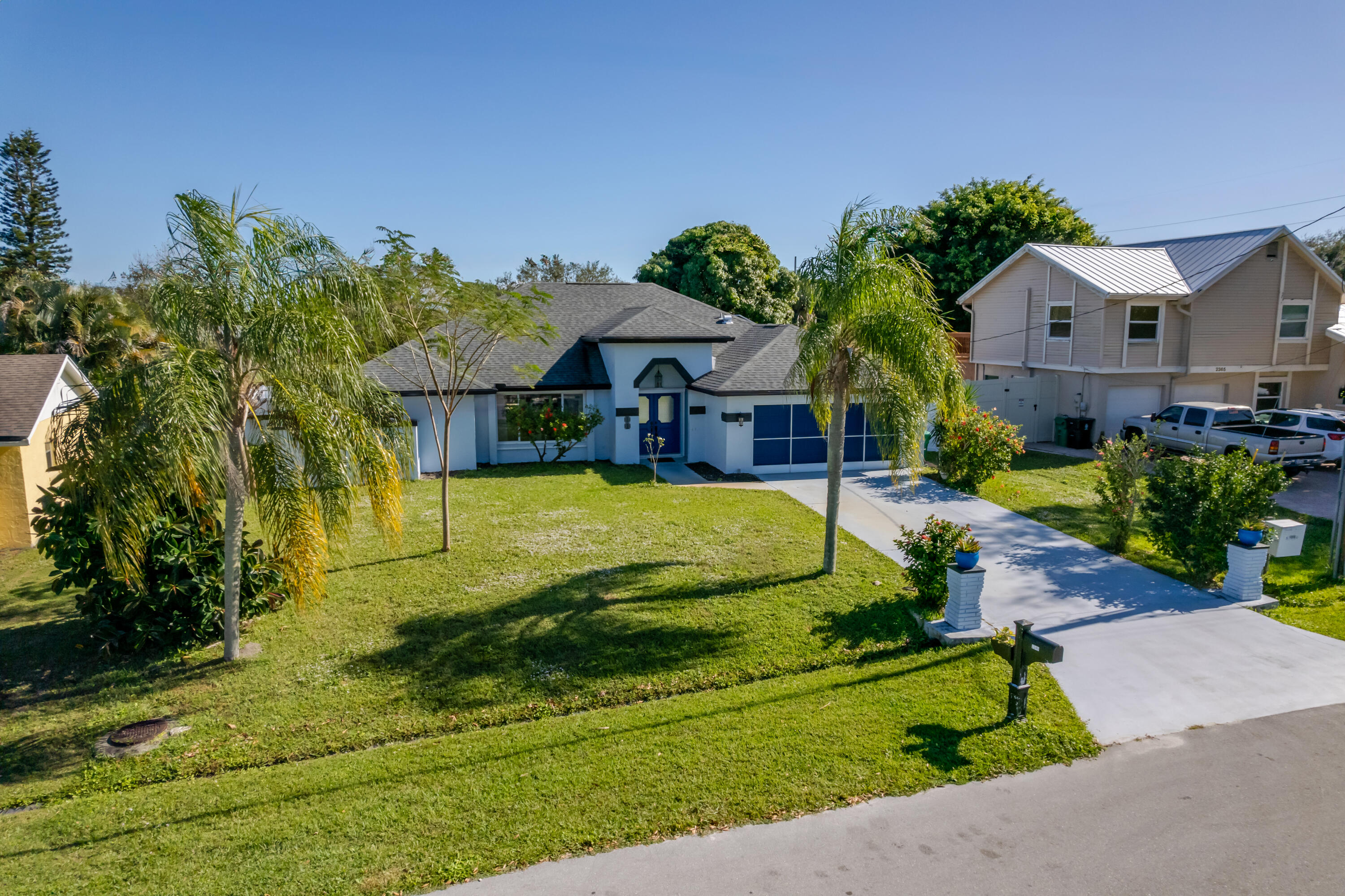 2349 Southeast Pinero Road Port St. Lucie, FL 34952 - Photo 5 of 54 Front aerial