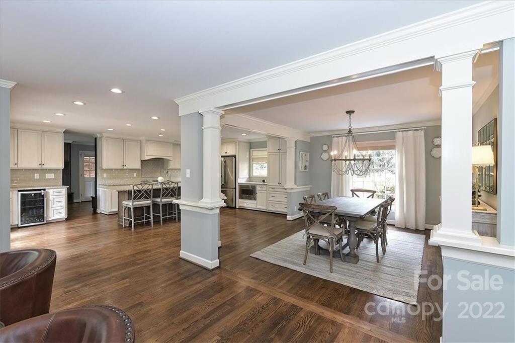 3100 Mountainbrook Road Charlotte, NC 28210 - Photo 16 of 48 a view of a dining room with furniture window and wooden floor