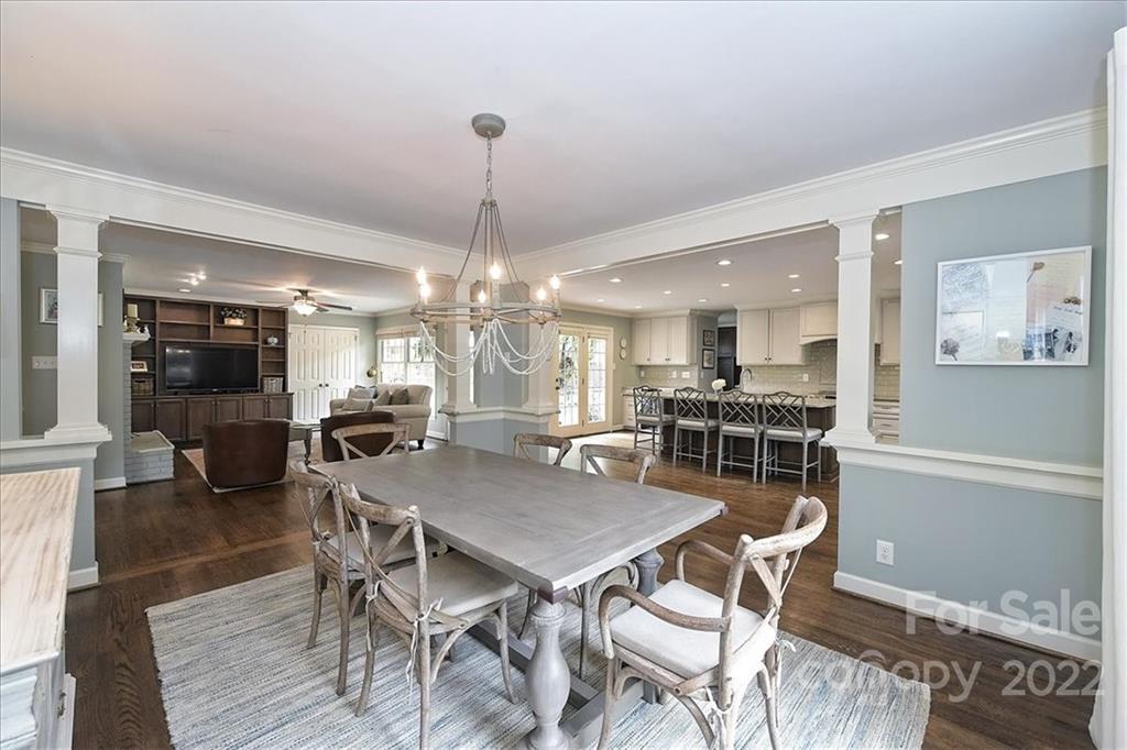 3100 Mountainbrook Road Charlotte, NC 28210 - Photo 19 of 48 a view of a dining room with furniture and wooden floor