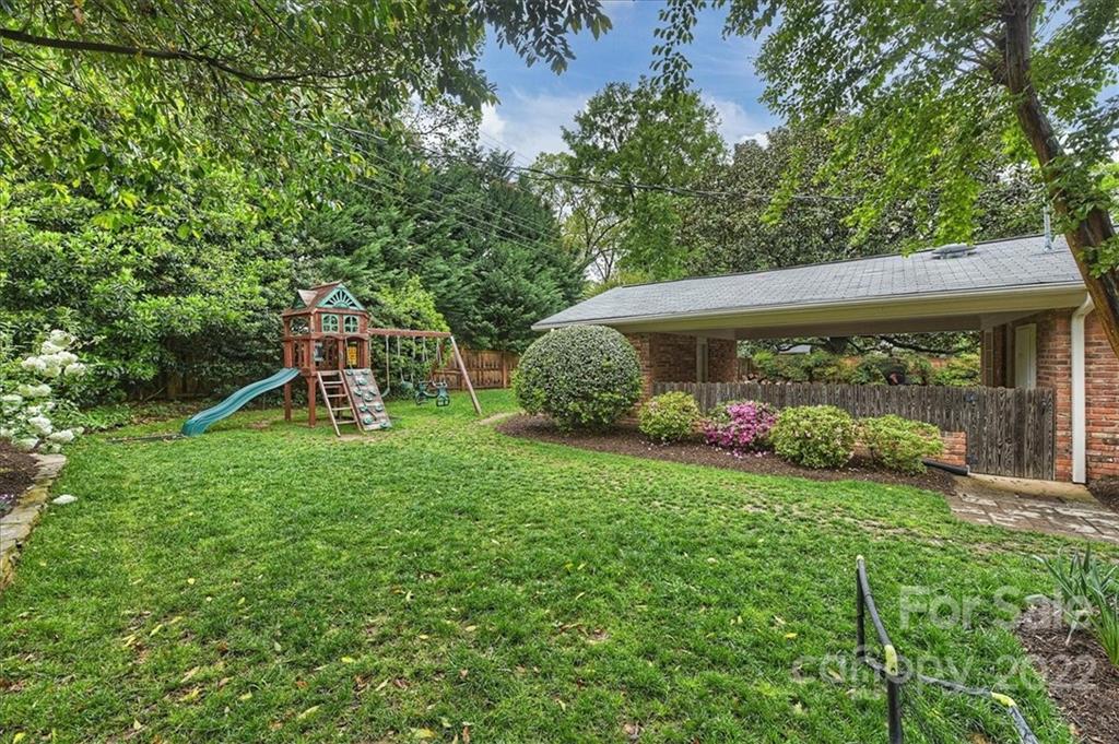 3100 Mountainbrook Road Charlotte, NC 28210 - Photo 43 of 48 a view of a house with a backyard