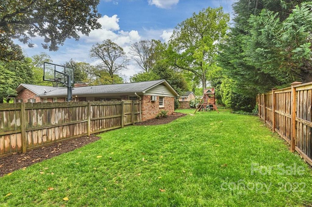 3100 Mountainbrook Road Charlotte, NC 28210 - Photo 46 of 48 a view of house with backyard and sitting area