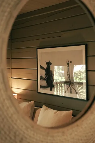 a living room with a couch and a large window