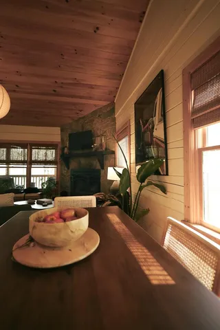 a room with gym equipment and a large window