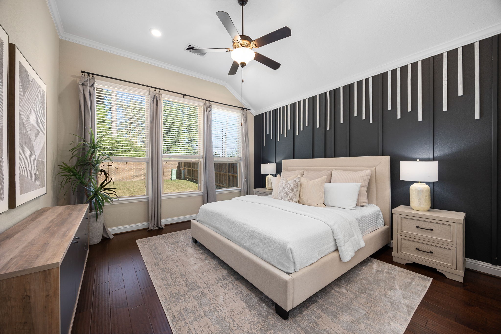 4225 Grand Oaks Wind Spring, TX 77386 - Photo 13 of 40 a bedroom with a large bed and a large window