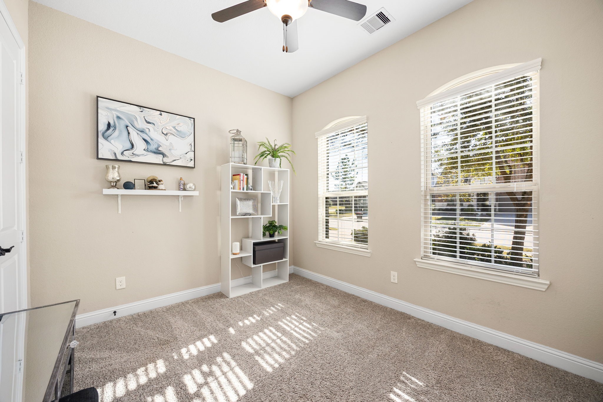 4225 Grand Oaks Wind Spring, TX 77386 - Photo 23 of 40 a view of a bedroom with furniture and windows