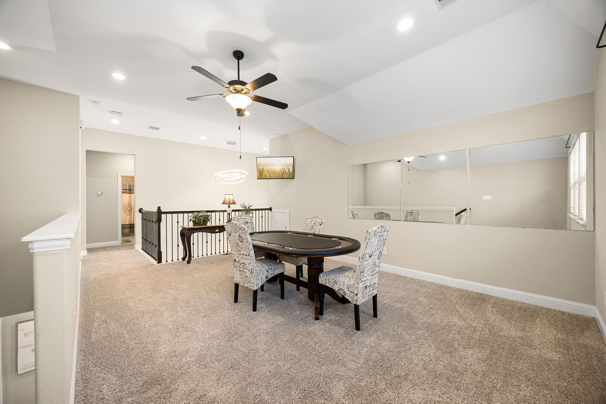 4225 Grand Oaks Wind Spring, TX 77386 - Photo 26 of 40 a view of a dining room with furniture and a chandelier