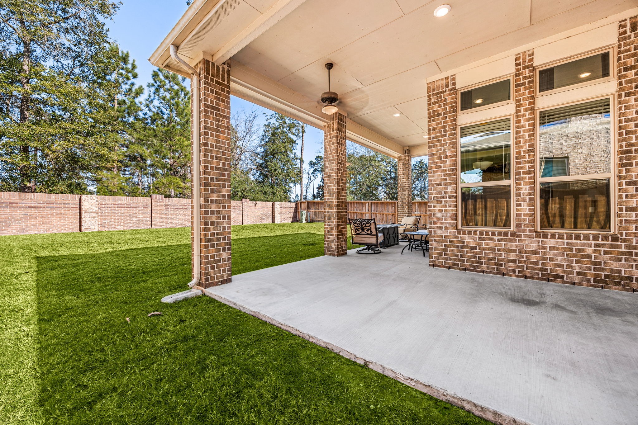 4225 Grand Oaks Wind Spring, TX 77386 - Photo 33 of 40 a view of a house with backyard and porch