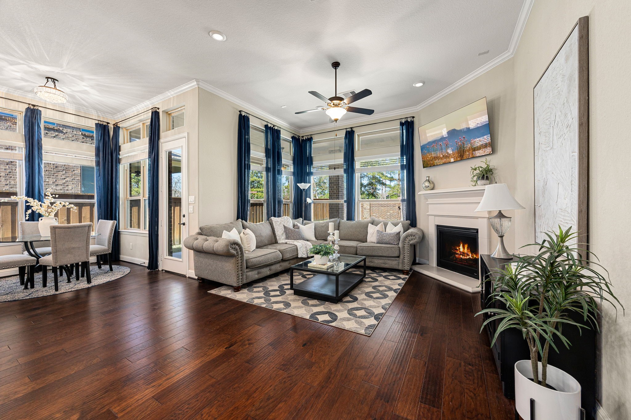4225 Grand Oaks Wind Spring, TX 77386 - Photo 6 of 40 a living room with furniture large window and fireplace