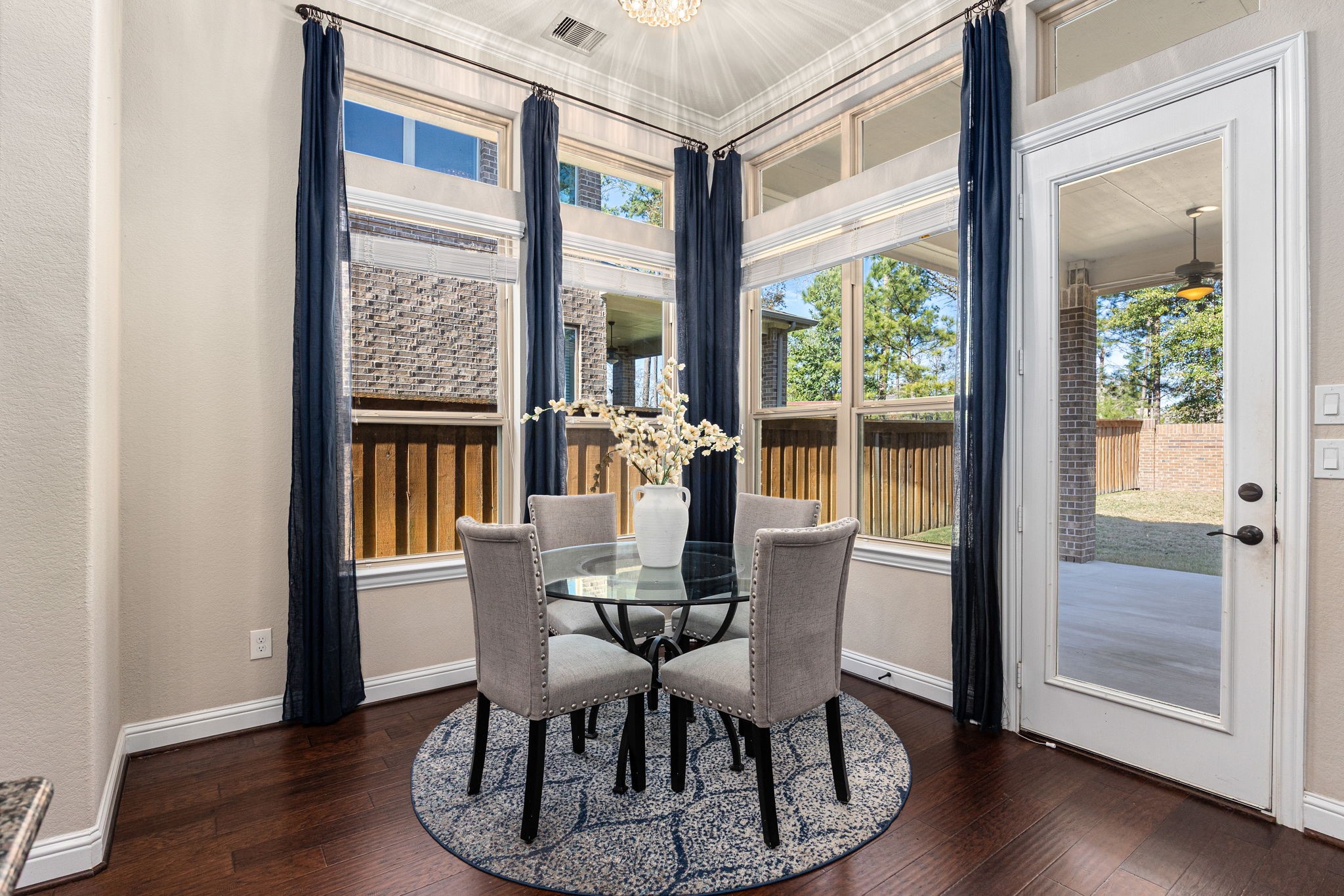 4225 Grand Oaks Wind Spring, TX 77386 - Photo 8 of 40 a view of a dining room with furniture and windows