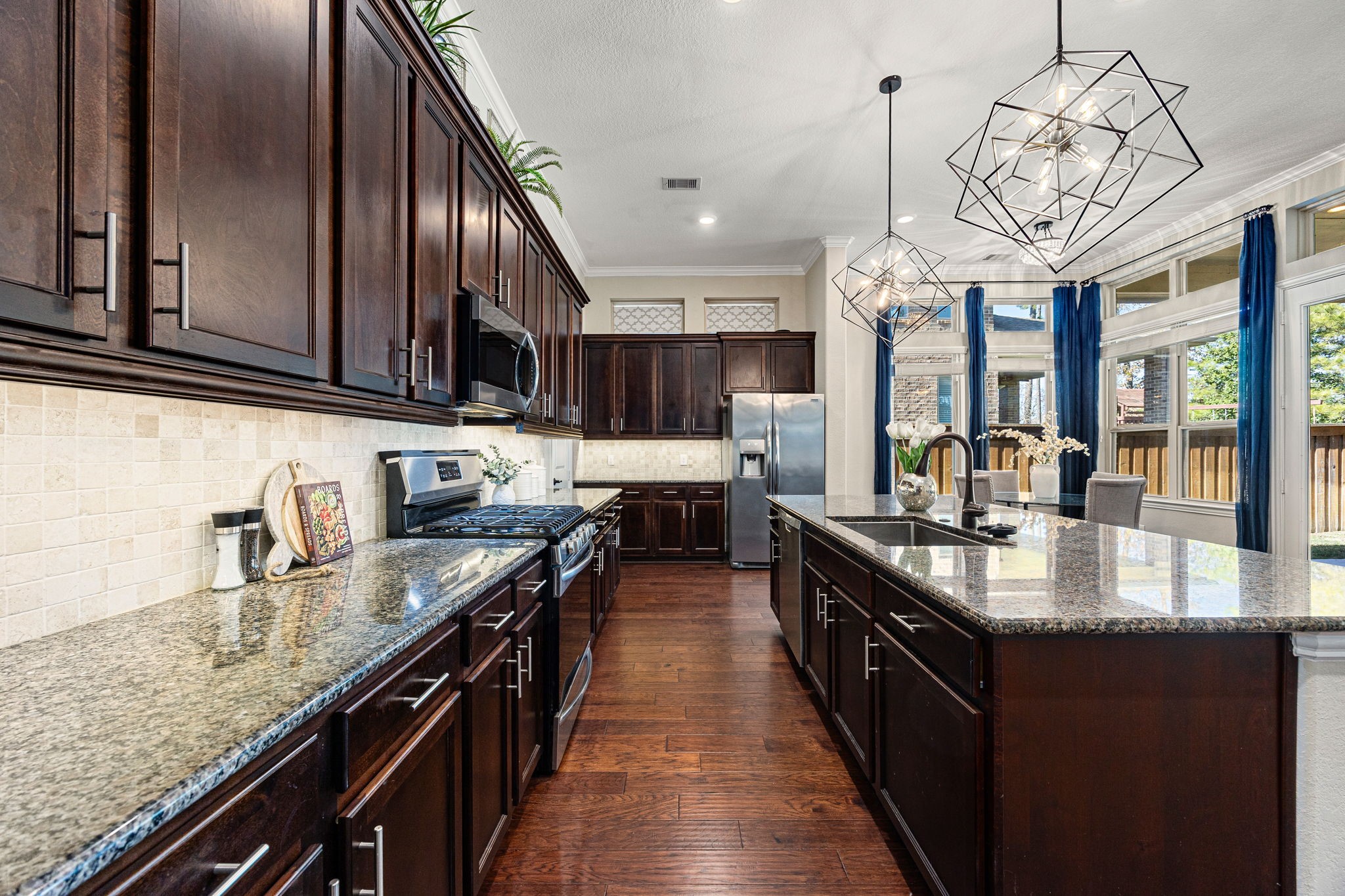 4225 Grand Oaks Wind Spring, TX 77386 - Photo 9 of 40 a large kitchen with granite countertop lots of counter top space