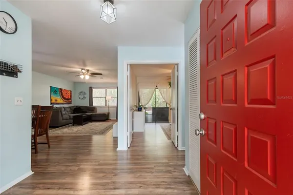 a view of a living room and dining room