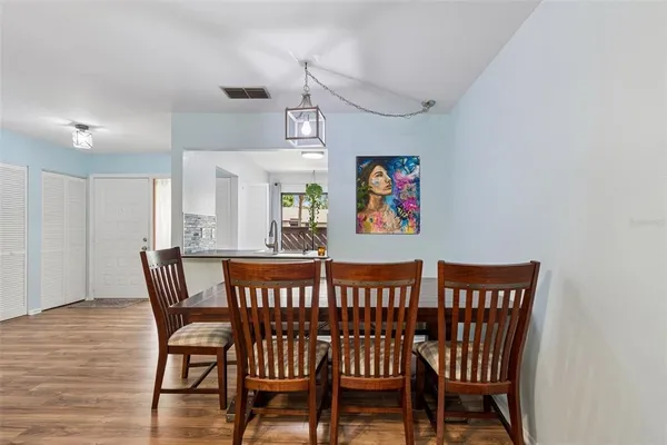 a view of a dining room with furniture