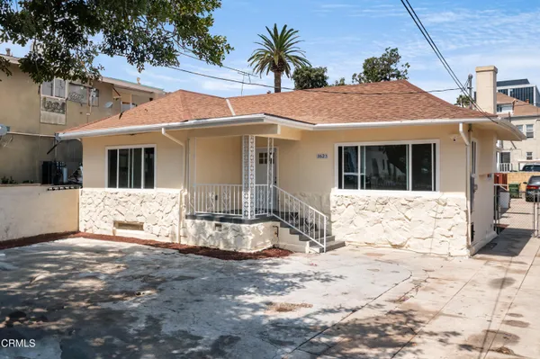 a front view of a house with a patio