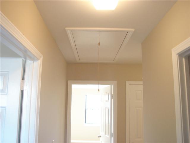 1284 Gen George Patton Road, Unit 1284 Nashville, TN 37221 - Photo 11 of 20 Pull-down stairs on second level for additional storage.
