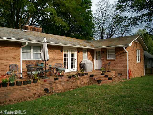 Exterior Back. brick patio