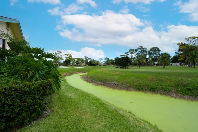 a view of a golf course with a garden