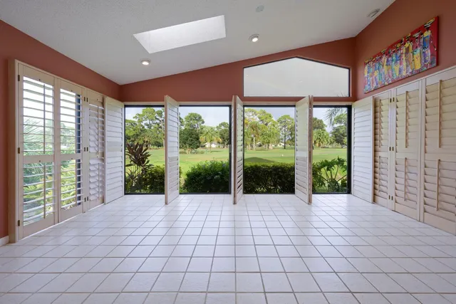 a view of an entryway with flower plant