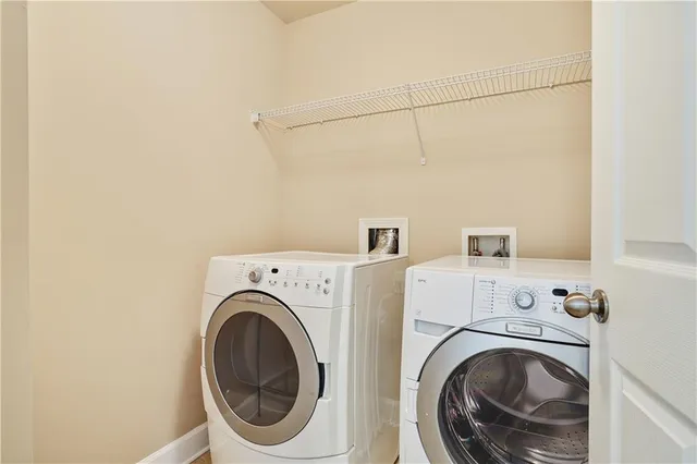 a swimming pool with outdoor seating and yard