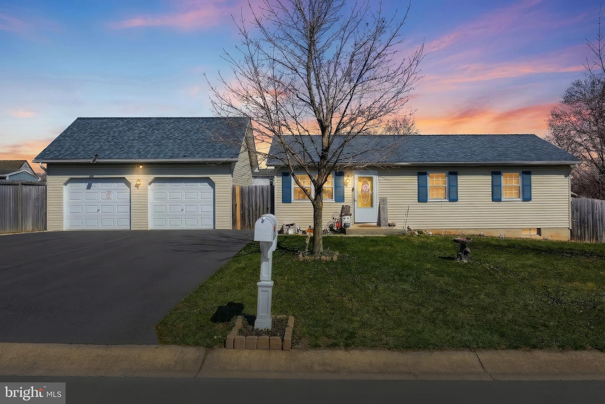 3551 Ruffed Grouse Drive Dover, PA 17315 - Photo 1 of 30 a house view with a garden space