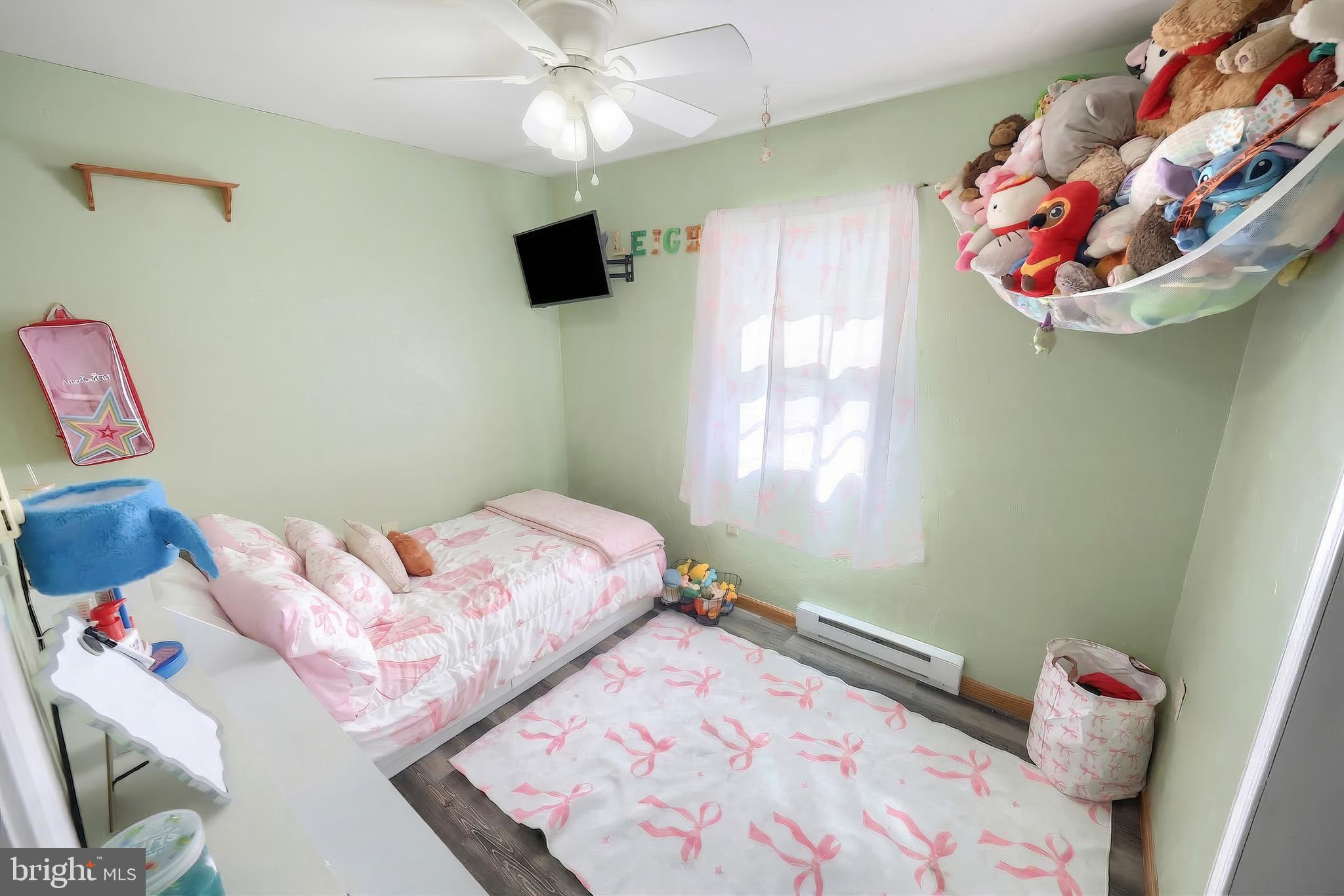 3551 Ruffed Grouse Drive Dover, PA 17315 - Photo 14 of 30 a bedroom with a bed and a chandelier