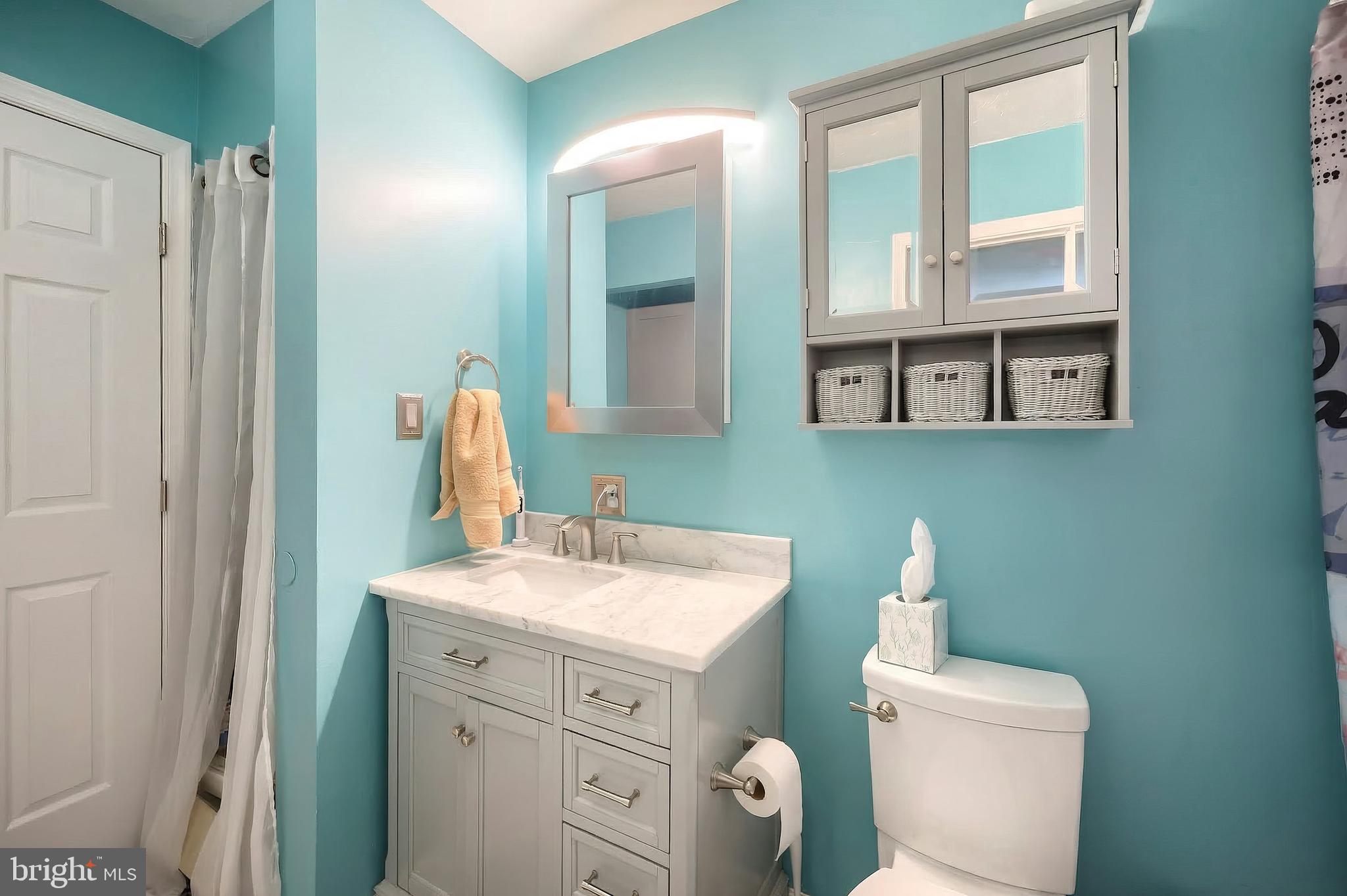 3551 Ruffed Grouse Drive Dover, PA 17315 - Photo 16 of 30 a bathroom with a toilet sink and mirror