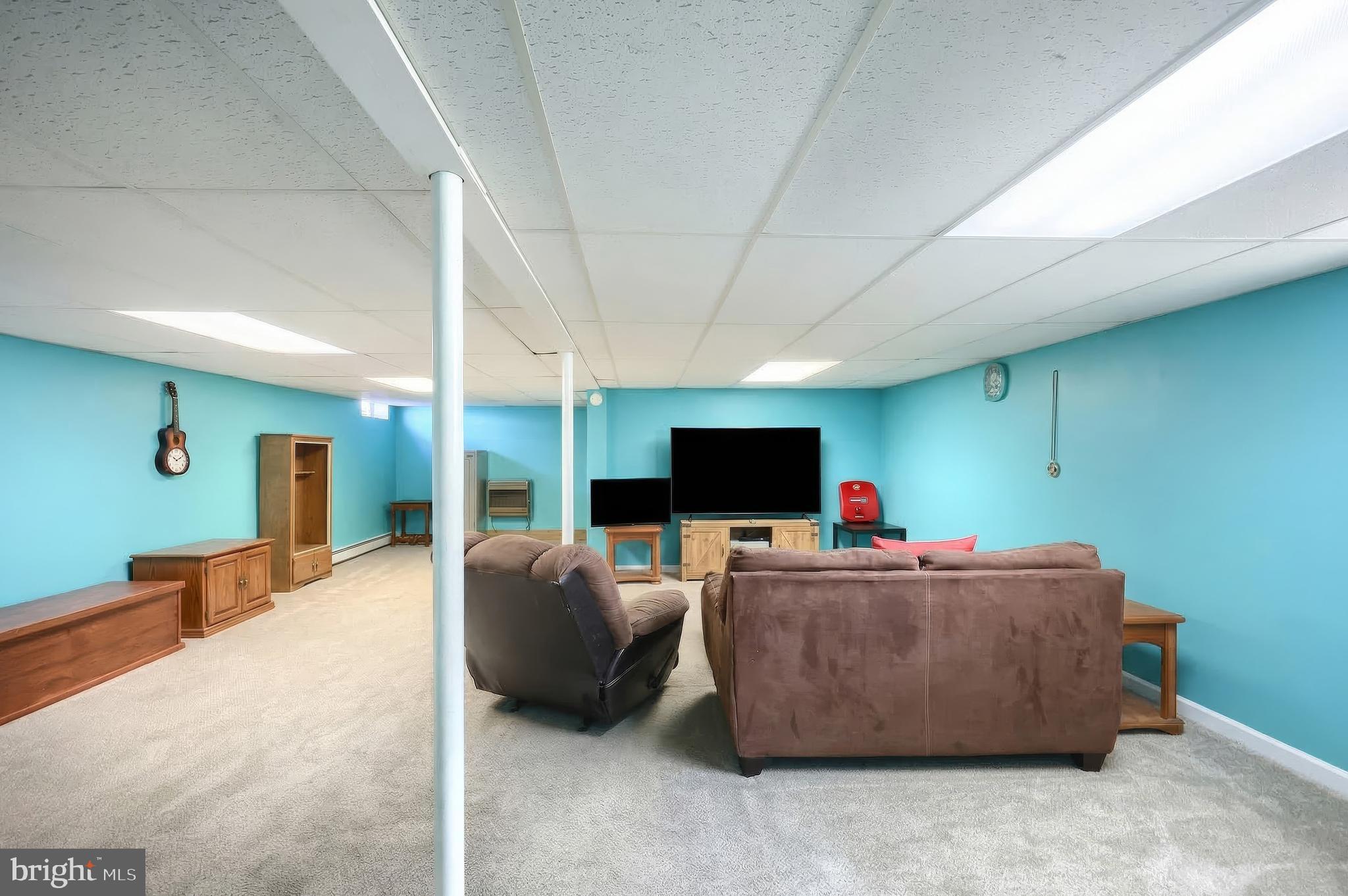 3551 Ruffed Grouse Drive Dover, PA 17315 - Photo 17 of 30 a living room with furniture and a flat screen tv