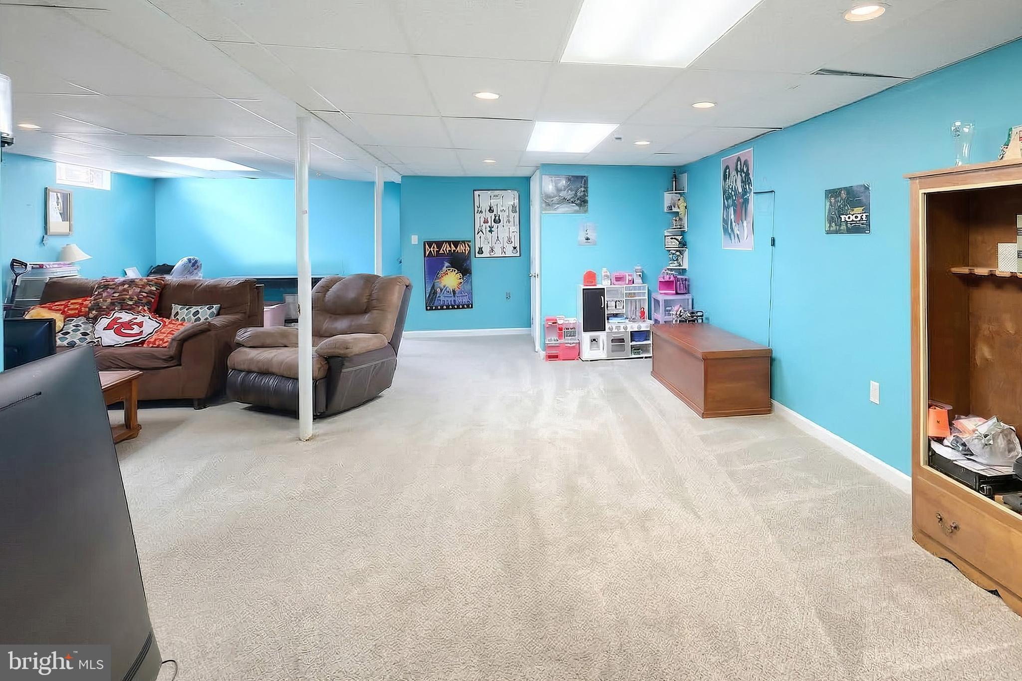 3551 Ruffed Grouse Drive Dover, PA 17315 - Photo 18 of 30 a view of a livingroom with furniture and a flat screen tv