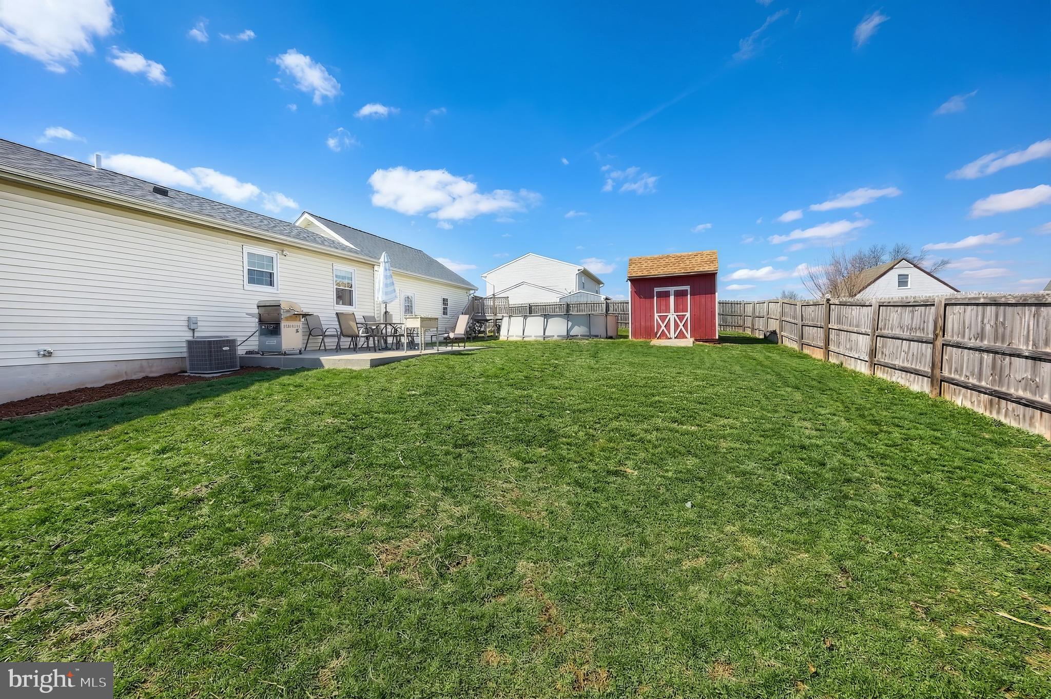 3551 Ruffed Grouse Drive Dover, PA 17315 - Photo 22 of 30 a view of a house with a yard and sitting area