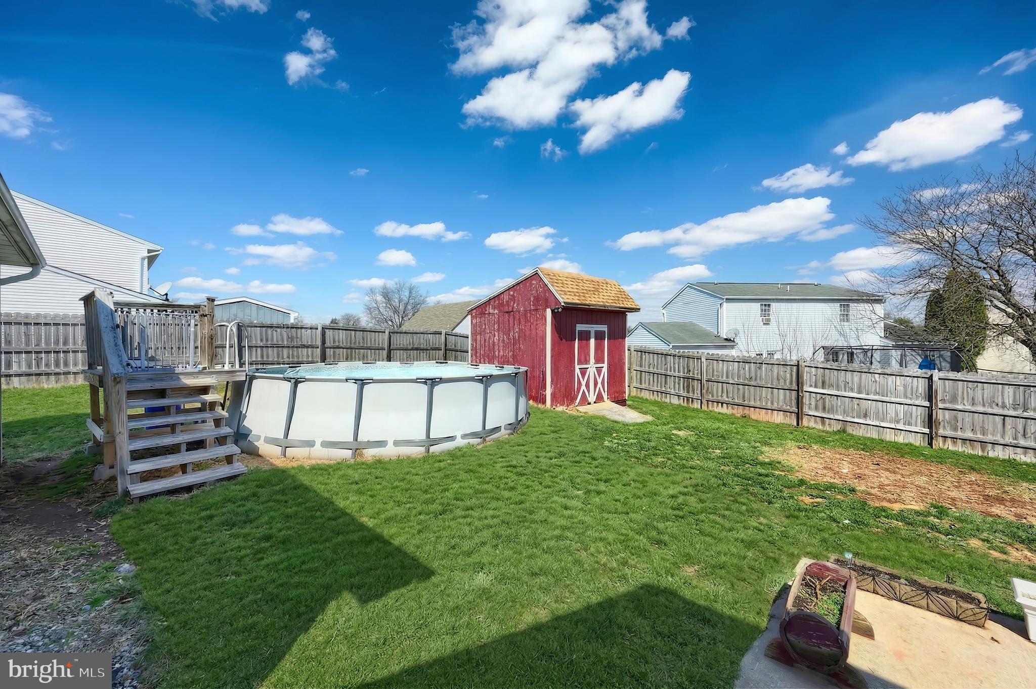 3551 Ruffed Grouse Drive Dover, PA 17315 - Photo 23 of 30 a view of a house with a yard porch and sitting area