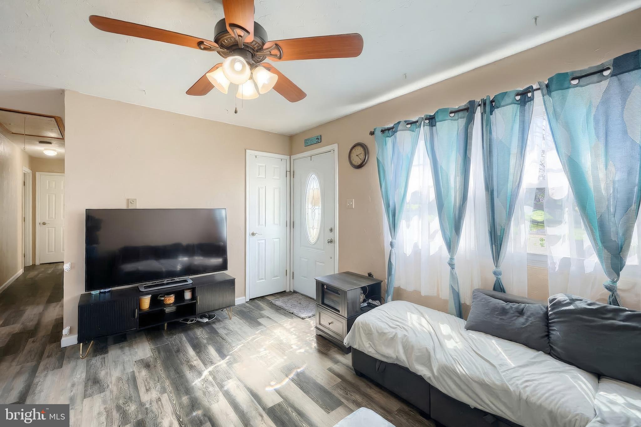 3551 Ruffed Grouse Drive Dover, PA 17315 - Photo 5 of 30 a living room with furniture and a flat screen tv