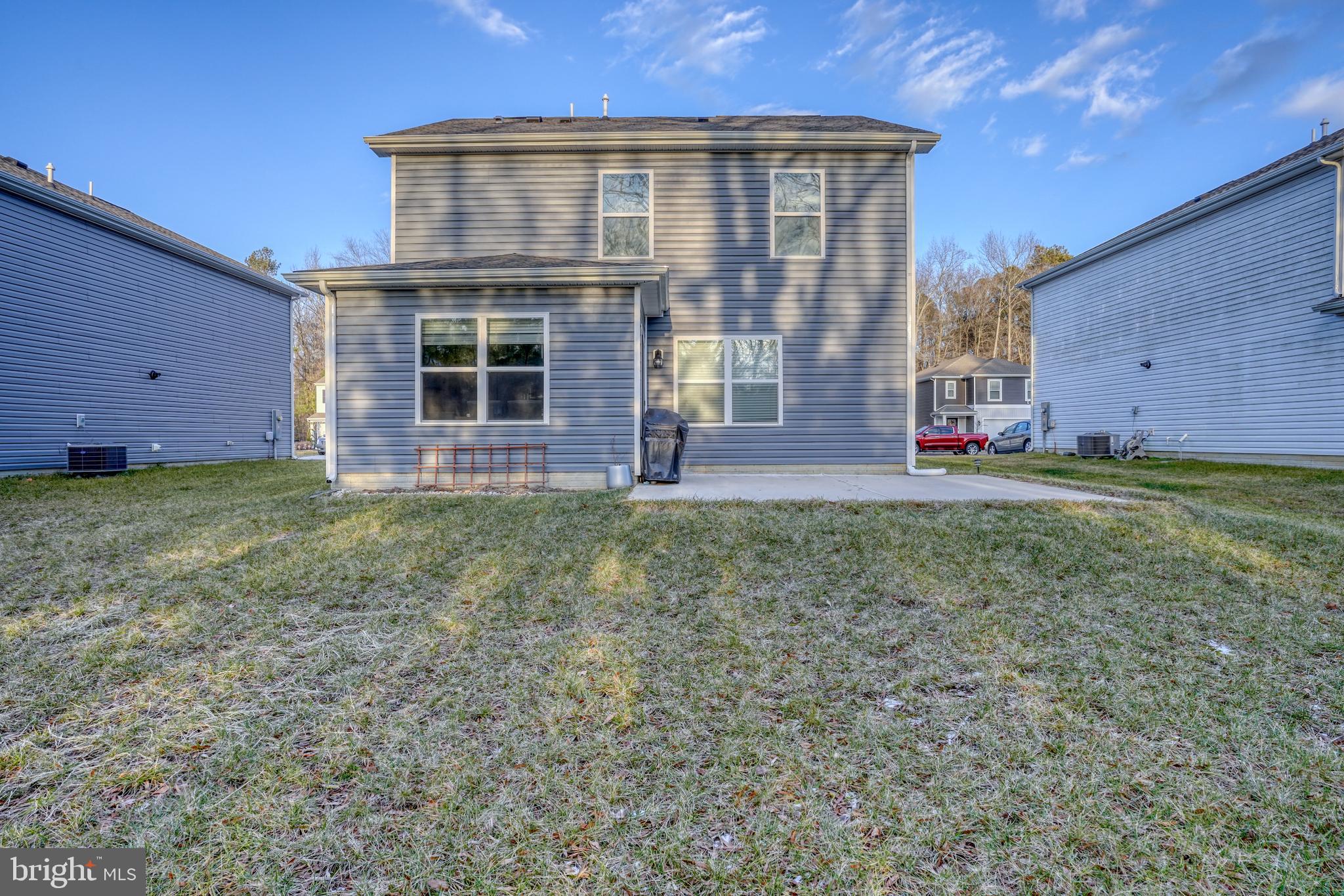 124 Currant Circle Magnolia, DE 19962 - Photo 12 of 45 a front view of a house with a yard