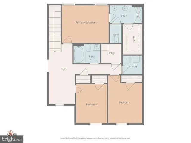 a kitchen with white cabinets and refrigerator