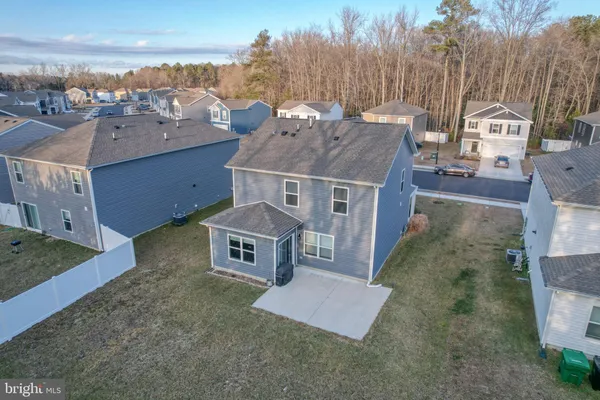 a top view of a house with a yard