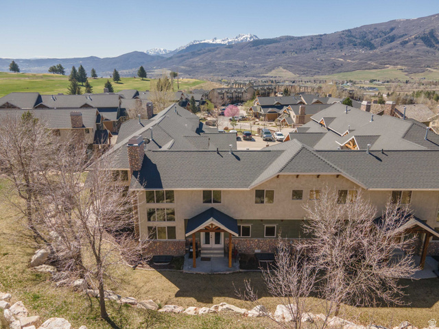 5168 Fairview Loop, Unit C604 Eden, UT 84310 - Photo 40 of 53 Aerial view of residential area with a mountain backdrop