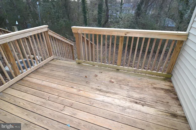 a front view of a house with a large windows