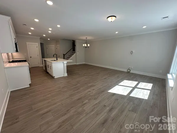 a bathroom with a sink a toilet and a shower