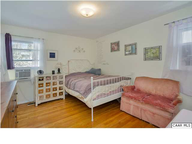 1423 Ricky Road Charlottesville, VA 22901 - Photo 13 of 16 a bedroom with furniture and a window