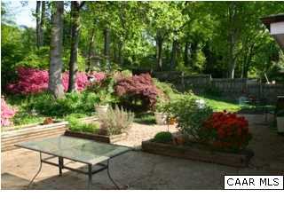 1423 Ricky Road Charlottesville, VA 22901 - Photo 16 of 16 a backyard of a house with a yard and outdoor seating