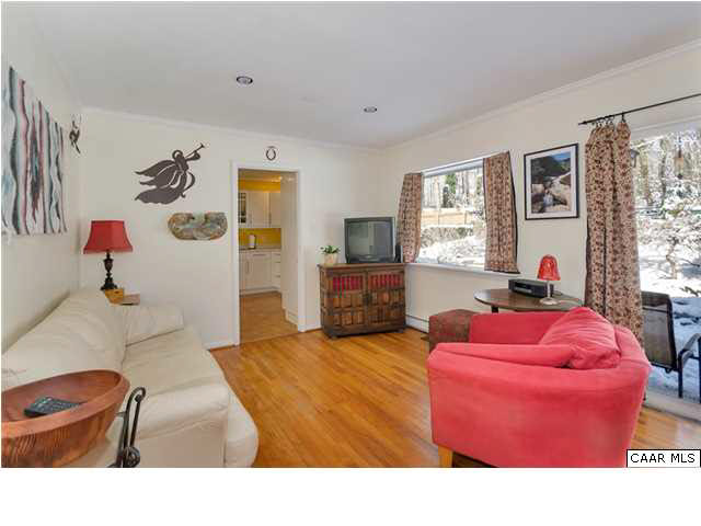 1423 Ricky Road Charlottesville, VA 22901 - Photo 5 of 16 a living room with furniture and a flat screen tv
