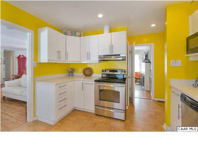 1423 Ricky Road Charlottesville, VA 22901 - Photo 8 of 16 a kitchen with kitchen island sink stove and cabinets