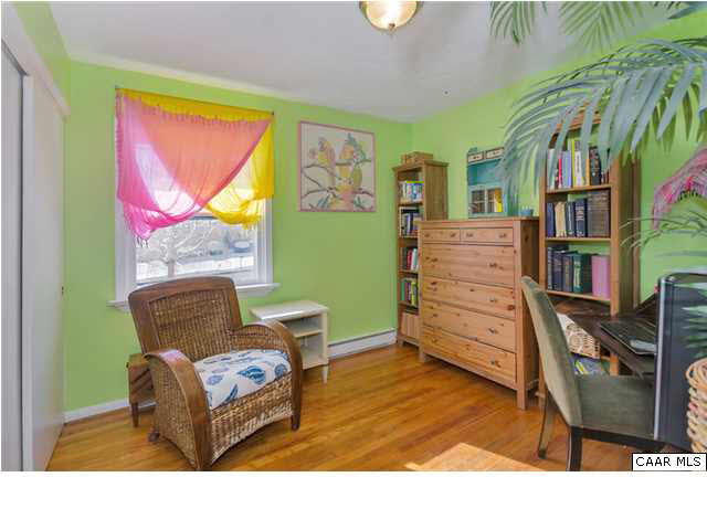 1423 Ricky Road Charlottesville, VA 22901 - Photo 10 of 16 a room with furniture and painting on the wall