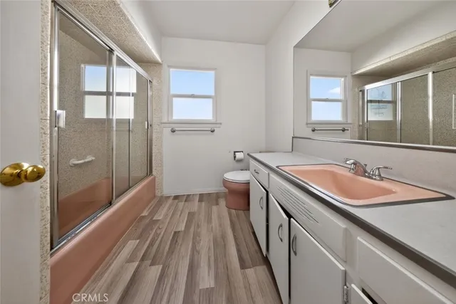 a bathroom with a sink and a large mirror