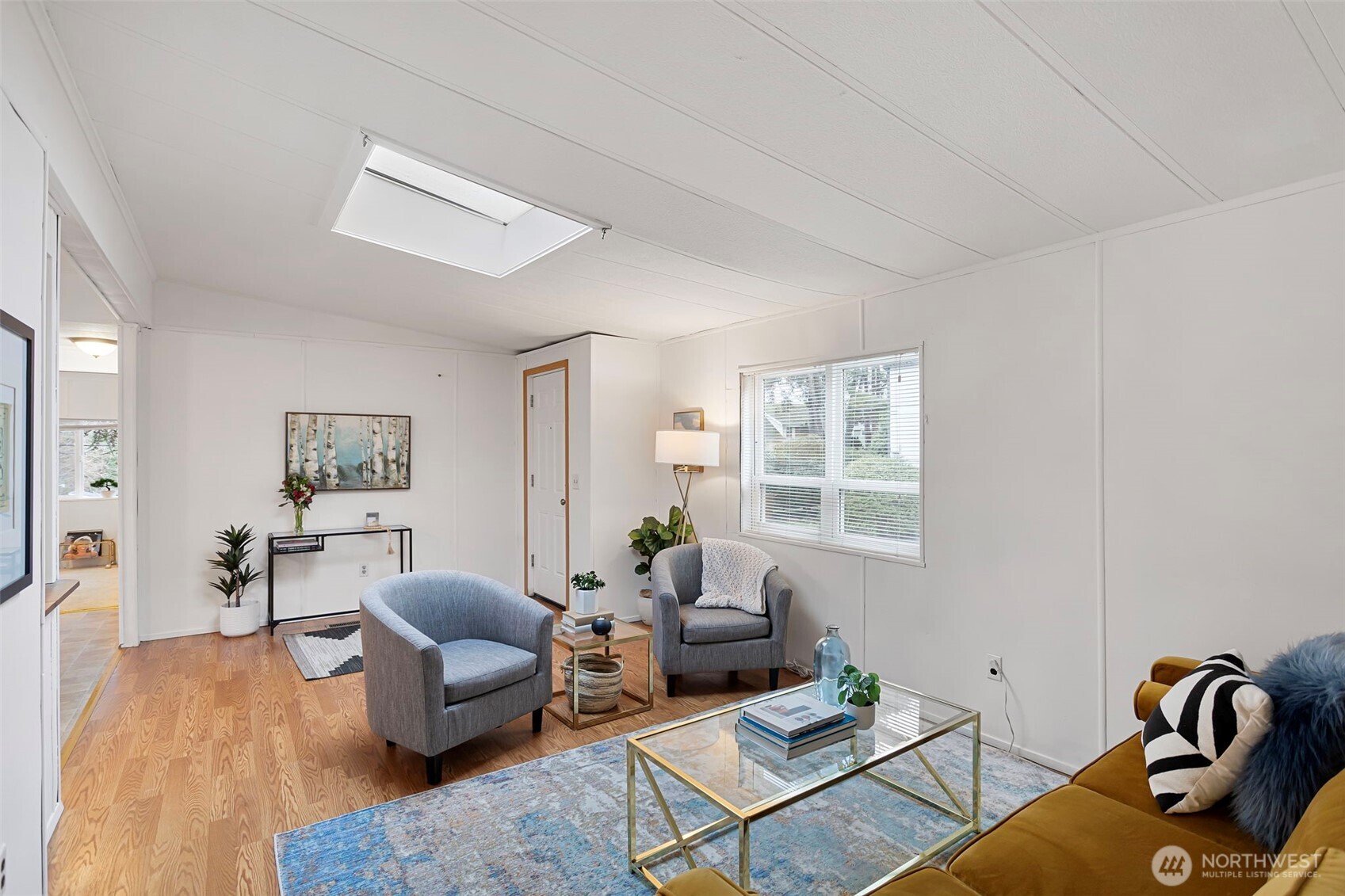 19015 16th Avenue Northeast Shoreline, WA 98155 - Photo 22 of 38 a living room with furniture rug and window