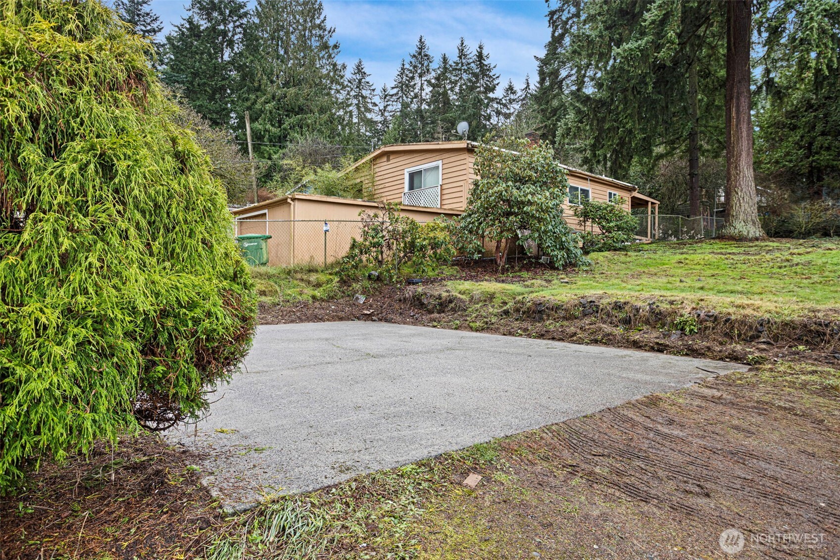 19015 16th Avenue Northeast Shoreline, WA 98155 - Photo 3 of 37 a front view of house with yard and trees