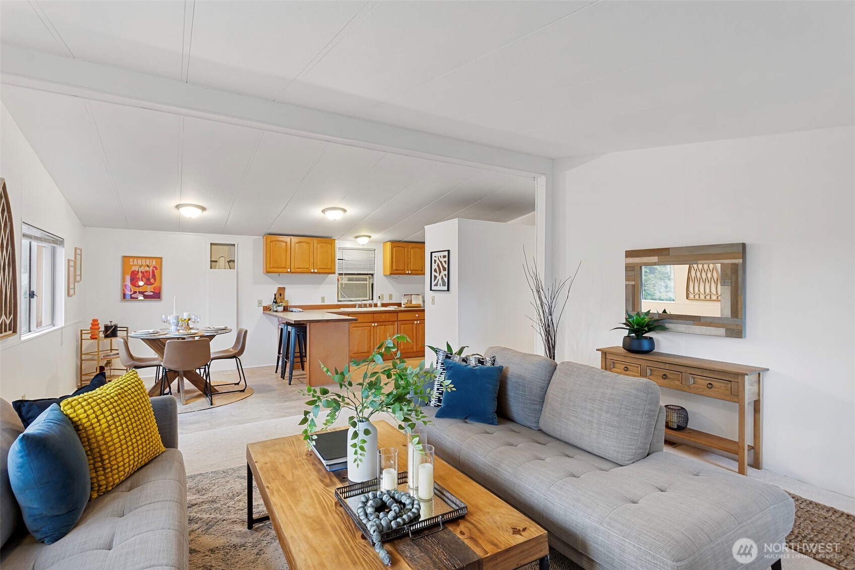 19015 16th Avenue Northeast Shoreline, WA 98155 - Photo 7 of 37 a living room with furniture and kitchen view
