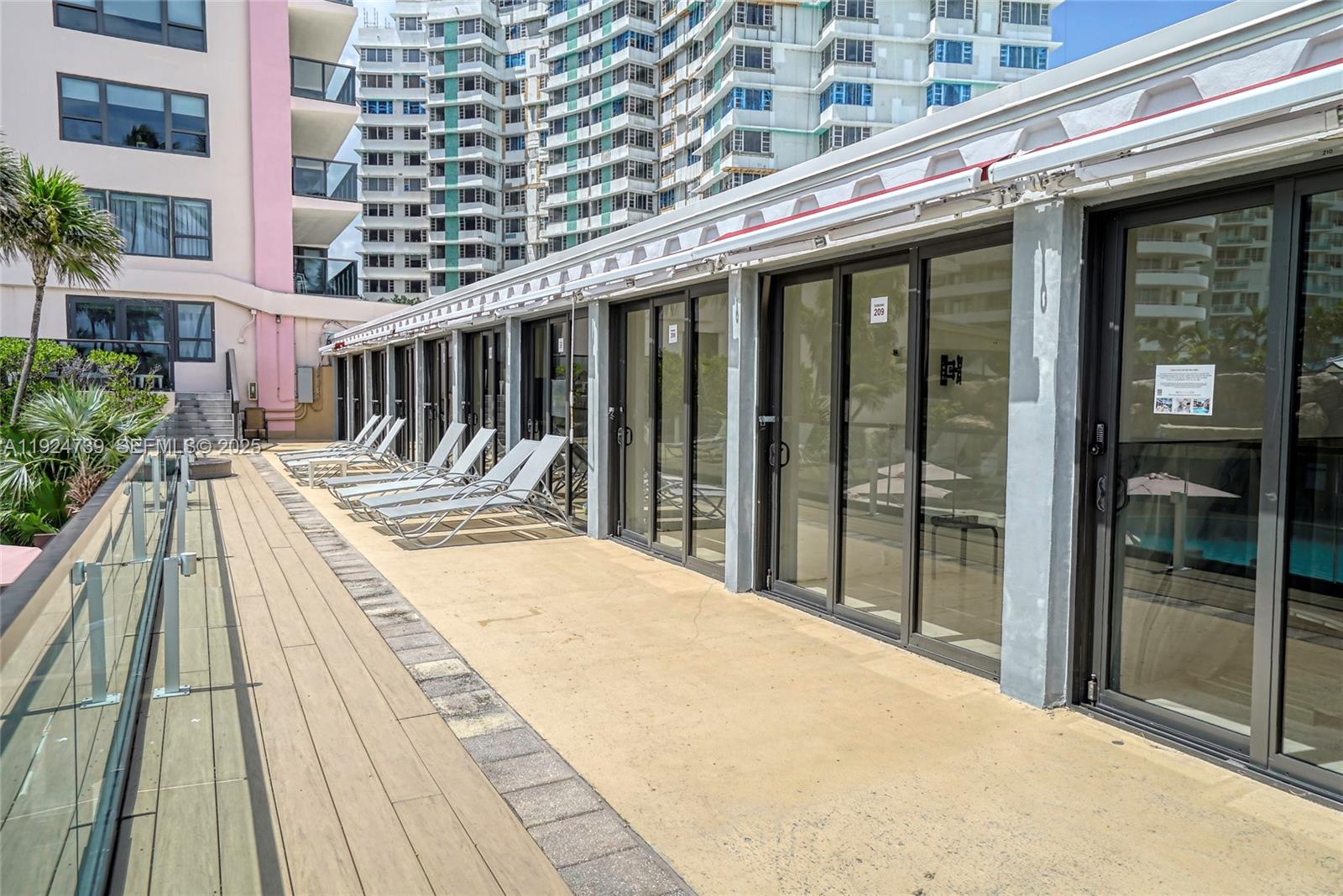 5225 Collins Avenue, Unit 1204 Miami Beach, FL 33140 - Photo 12 of 49 a view of balcony with wooden floor