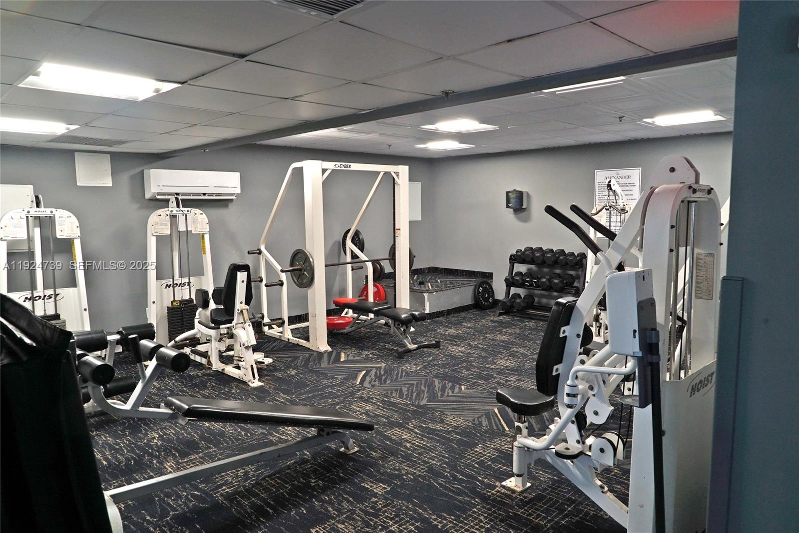 5225 Collins Avenue, Unit 1204 Miami Beach, FL 33140 - Photo 41 of 49 a view of a room with gym equipment