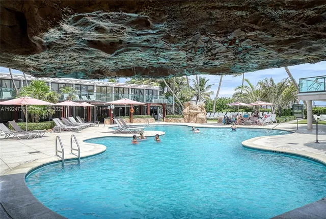 a view of a house with swimming pool